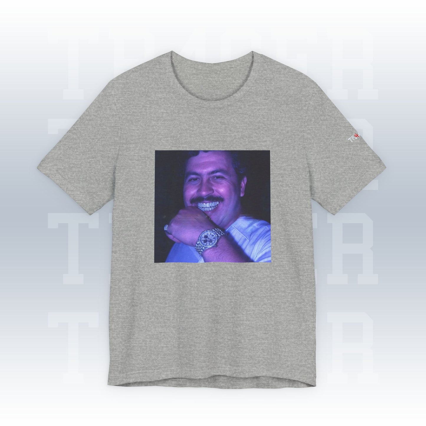 Gray t-shirt with a graphic of a smiling man on a white background