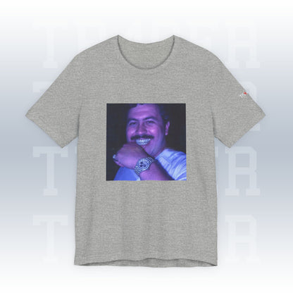 Gray t-shirt with a graphic of a smiling man on a white background